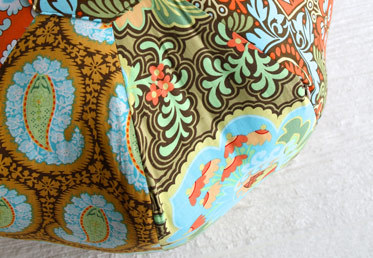 Amy Butler teaches you how to build a diy pillow in sections, insert an invisible zipper and finish the pillow in this class.