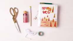 An art journal with the title Merry Be from Dawn Sokol's Holiday Art Journaling class on Creativebug.