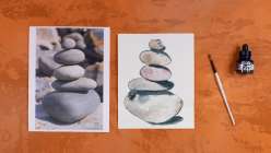 An image of a stack of rocks next to an image of the same stack rendered in acrylic ink and watercolor. 