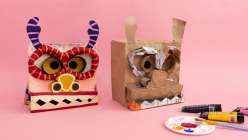 Two paper mache masks made by Katrina Wheeler in her Make a Paper Mache Dragon Head class on Creativebug