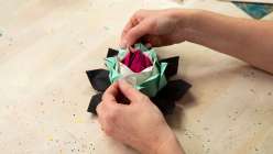 A paper lotus flower made in Mia Semingson's Fold a Paper Lotus Flower class on Creativebug