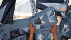 Three pairs of straight leg jeans upcycled into flare jeans by Sandra Lee Chandler in her Upcycled Denim: Side Seam Remix class on Creativebug.