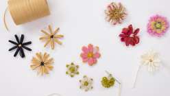 A selection of hand-loomed flowers made by crochet artist Twinkie Chan in her Flower Loom Basics class on Creativebug 