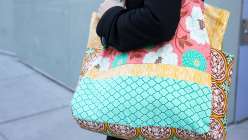 Joel Dewberry and Laurie combine their love of colorful fabric with sewing know-how to make a stunning and sturdy farmer’s market tote bag. Both the interior and exterior of the bag are pieced together with eye-catching fabrics. 