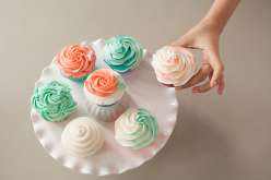 Emily Tatak from Wiltons teaches piping basics, consistency and color of buttercream, filling a cake-decorating bag, how to make pretty rosettes, classic swirls, adding stripes!