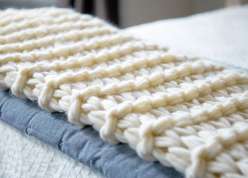 In this knitting lesson you'll learn to make this great throw blanket!