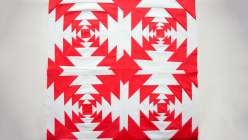 Red and white quilts are stunning, especially when they're made with pineapple blocks