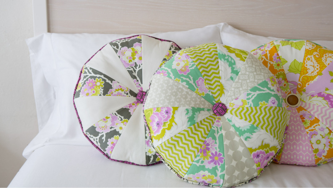 Round Button Cartwheel Pillow by Heather Bailey Creativebug